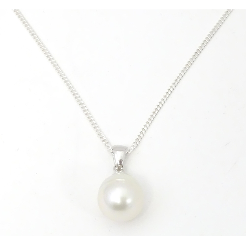 657 - A 9ct white gold pendant set South Sea cultured pearl & Sri Lankan white sapphire, on a silver chain... 