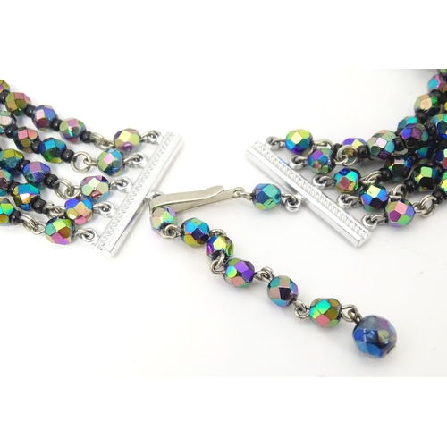 764 - Assorted jewellery to include various bead necklaces together with a pair of earrings