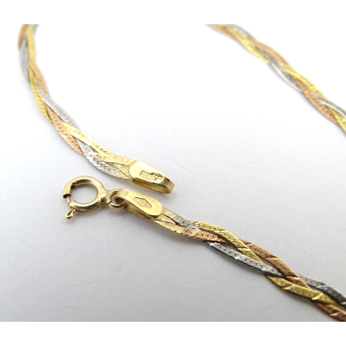 695A - A 9ct 3 colour gold necklace. Approx 16