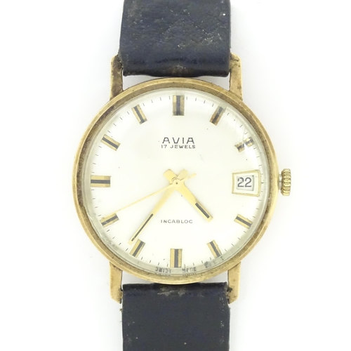 784 - A gents 9ct gold cased Avia 17 jewels incabloc wristwatch with date aperture at 3, hallmarked London... 