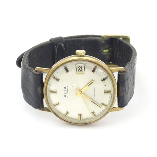 784 - A gents 9ct gold cased Avia 17 jewels incabloc wristwatch with date aperture at 3, hallmarked London... 