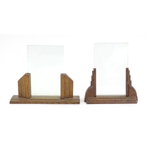 1127 - An Art Deco oak and glass photograph frame. Together with another Bakelite and glass example. Larges... 