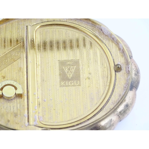 1146 - A 20thC Kigu gilt metal Concerto musical compact with mother of pearl detail to top. Approx. 3 1/4