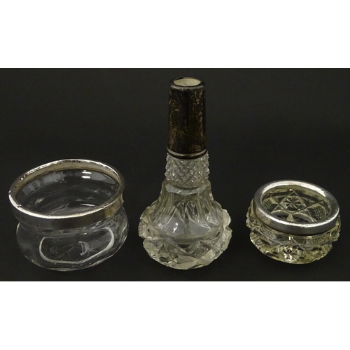 175 - Three items of silver mounted glass ware to include a bowl, salt and scent bottle The tallest Approx... 