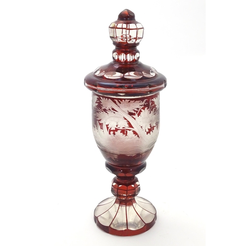 186 - A Victorian Bohemian ruby red and clear glass vase and cover with etched stag  / deer in landscape d... 