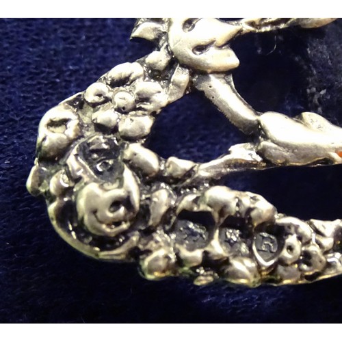 448 - A Victorian silver nurses buckle. Hallmarked London 1892 maker William Comyns & Sons. 4 1/4