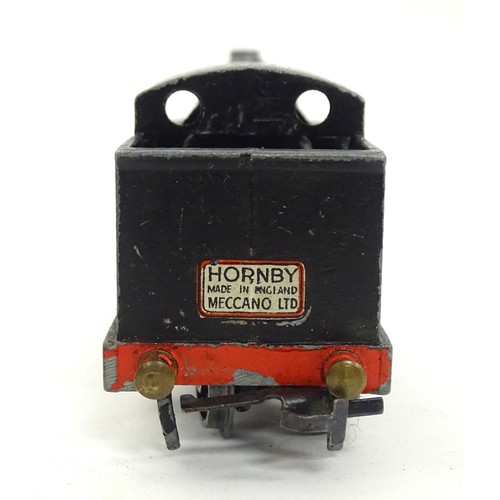 821 - Toys: A quantity of assorted Hornby O Gauge model railway / train items to include a rolling stock w... 