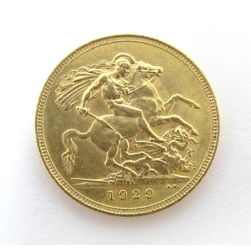 796 - Coin : A George V 1929 gold sovereign coin. Total weight approx. 8g