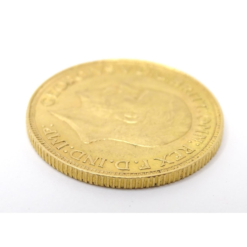 796 - Coin : A George V 1929 gold sovereign coin. Total weight approx. 8g