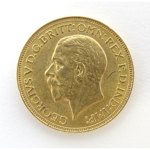 796 - Coin : A George V 1929 gold sovereign coin. Total weight approx. 8g