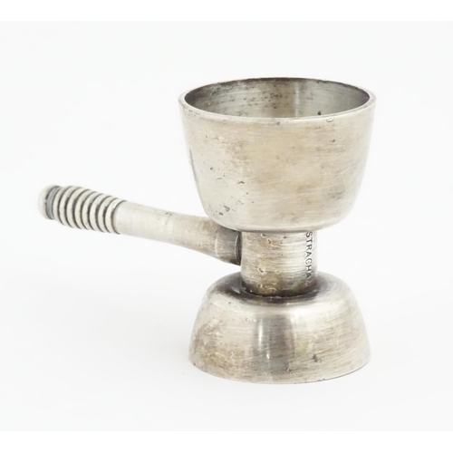 1064 - A 20thC double ended jigger / spirit measure. Approx. 3 1/4