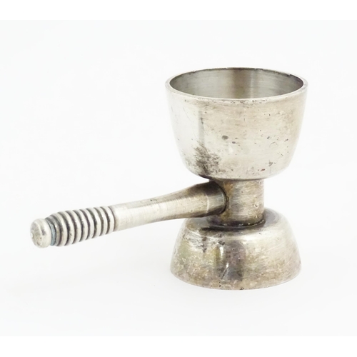 1064 - A 20thC double ended jigger / spirit measure. Approx. 3 1/4