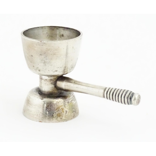 1064 - A 20thC double ended jigger / spirit measure. Approx. 3 1/4