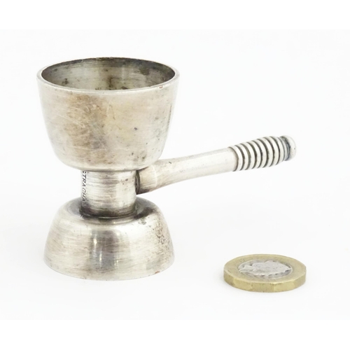 1064 - A 20thC double ended jigger / spirit measure. Approx. 3 1/4