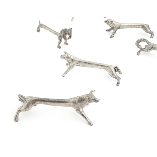 1066 - A quantity of 20thC Continental novelty knife rests modelled as animals to include ram, pig, bear, f... 