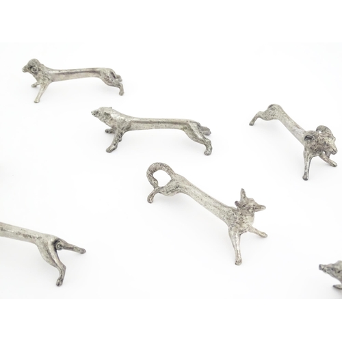 1066 - A quantity of 20thC Continental novelty knife rests modelled as animals to include ram, pig, bear, f... 