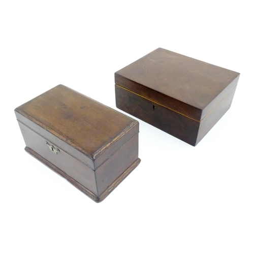 1086 - A 19thC mahogany box with hinged lid. Together with a 19thC mahogany caddy box.. Largest approx. 4 3... 