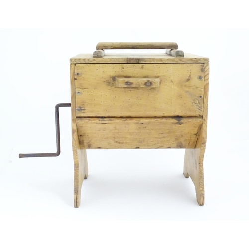 1081 - A 19thC pine butter churn, with iron crank handle rotating paddles to the interior. Standing approx ... 