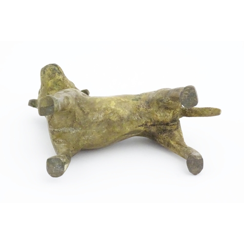 1087 - A cast model of a dog with gilt finish. Approx. 3 1/2