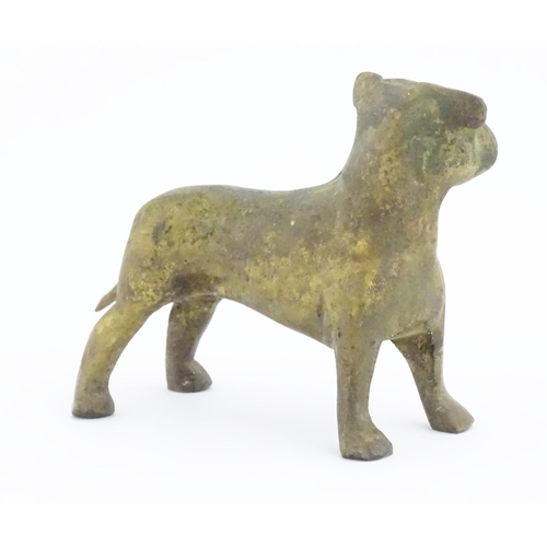 1087 - A cast model of a dog with gilt finish. Approx. 3 1/2