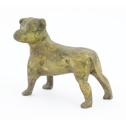 1087 - A cast model of a dog with gilt finish. Approx. 3 1/2