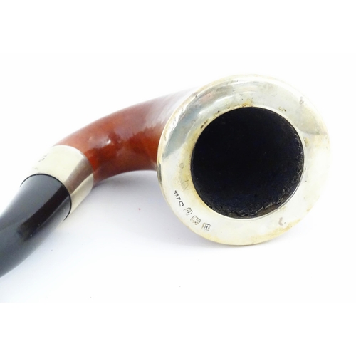 1090 - An early 20thC cased Calabash pipe, with black composite mouthpiece, the silver collar and bowl moun... 