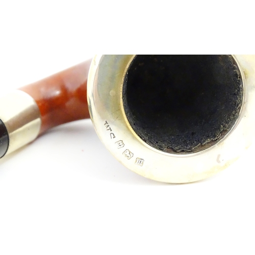 1090 - An early 20thC cased Calabash pipe, with black composite mouthpiece, the silver collar and bowl moun... 