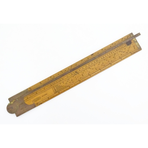 1099 - A Victorian folding boxwood and brass slide rule, no. 1506, maker J. Rabone & Sons. Approx. 12 1/2