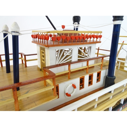 819 - A 20thC scratch built scale model of a 19thC paddle steamer boat , ' Mississippi Swan' , of wooden c... 