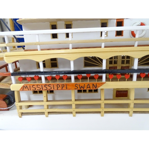 819 - A 20thC scratch built scale model of a 19thC paddle steamer boat , ' Mississippi Swan' , of wooden c... 