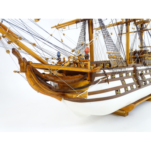 820 - A 20thC large scratch built scale model of a late 18thC war ship/ tall ship, with 74 guns over three... 