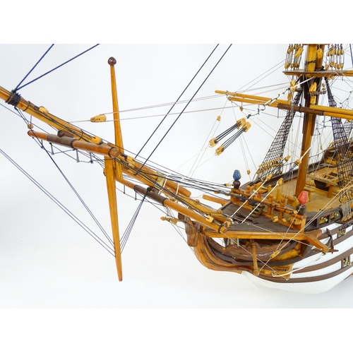 820 - A 20thC large scratch built scale model of a late 18thC war ship/ tall ship, with 74 guns over three... 