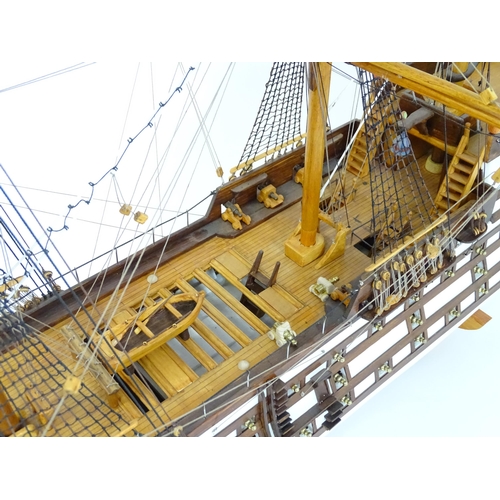 820 - A 20thC large scratch built scale model of a late 18thC war ship/ tall ship, with 74 guns over three... 