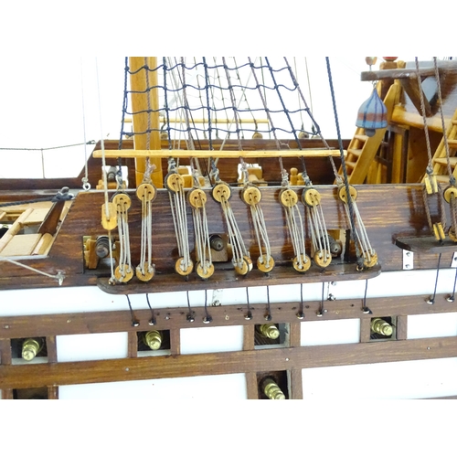 820 - A 20thC large scratch built scale model of a late 18thC war ship/ tall ship, with 74 guns over three... 