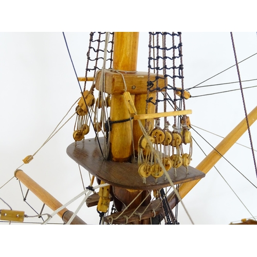 820 - A 20thC large scratch built scale model of a late 18thC war ship/ tall ship, with 74 guns over three... 