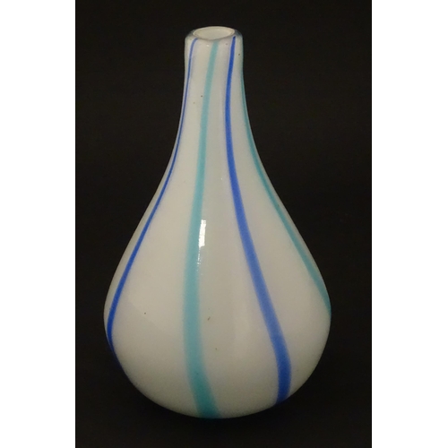 189 - An art glass vase, the white body with blue and turquoise stripe detail. Approx 8