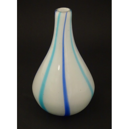 189 - An art glass vase, the white body with blue and turquoise stripe detail. Approx 8