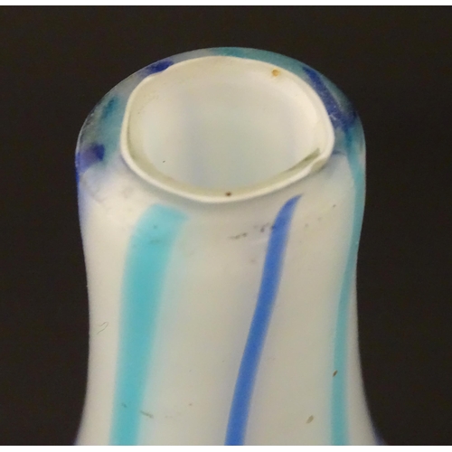 189 - An art glass vase, the white body with blue and turquoise stripe detail. Approx 8