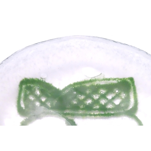 194 - An Art glass dish, the white ground with green abstract detail. Signed with monogram. Approx 4 1/2