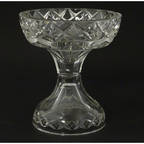 195 - A 19thC cut glass pineapple stand. Approx.  7