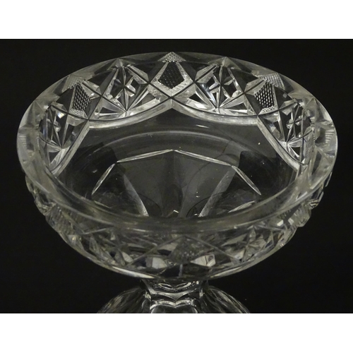 195 - A 19thC cut glass pineapple stand. Approx.  7