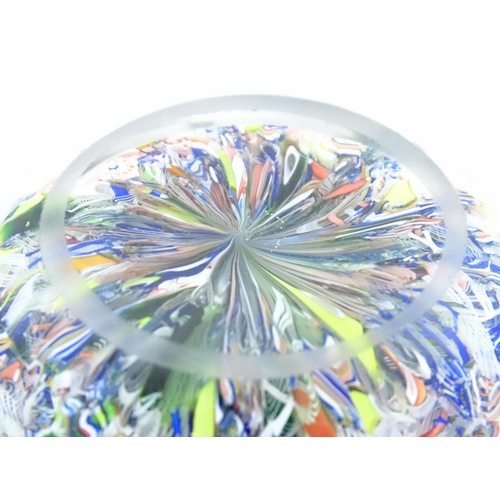 198 - A glass Millefiori paperweight. Approx 2