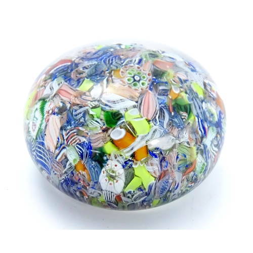 198 - A glass Millefiori paperweight. Approx 2