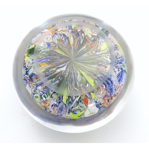 198 - A glass Millefiori paperweight. Approx 2