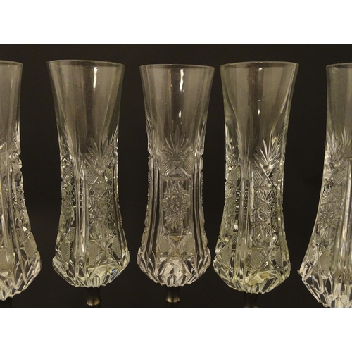 202 - A set of six Italian cut glass champagne flutes raised on  pewter stem and foot. Approx 11