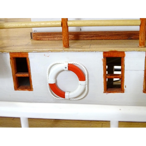 819 - A 20thC scratch built scale model of a 19thC paddle steamer boat , ' Mississippi Swan' , of wooden c... 