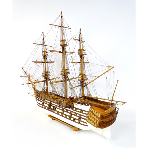 820 - A 20thC large scratch built scale model of a late 18thC war ship/ tall ship, with 74 guns over three... 