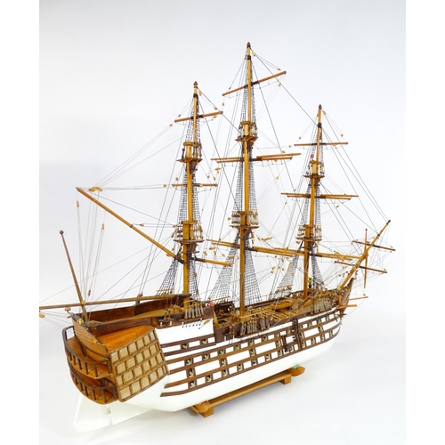 820 - A 20thC large scratch built scale model of a late 18thC war ship/ tall ship, with 74 guns over three... 