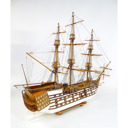 820 - A 20thC large scratch built scale model of a late 18thC war ship/ tall ship, with 74 guns over three... 