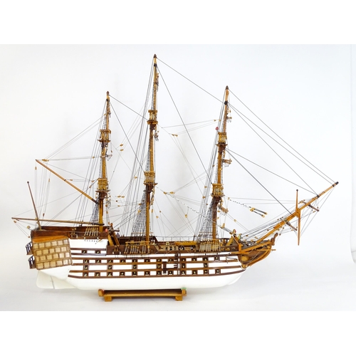 820 - A 20thC large scratch built scale model of a late 18thC war ship/ tall ship, with 74 guns over three... 